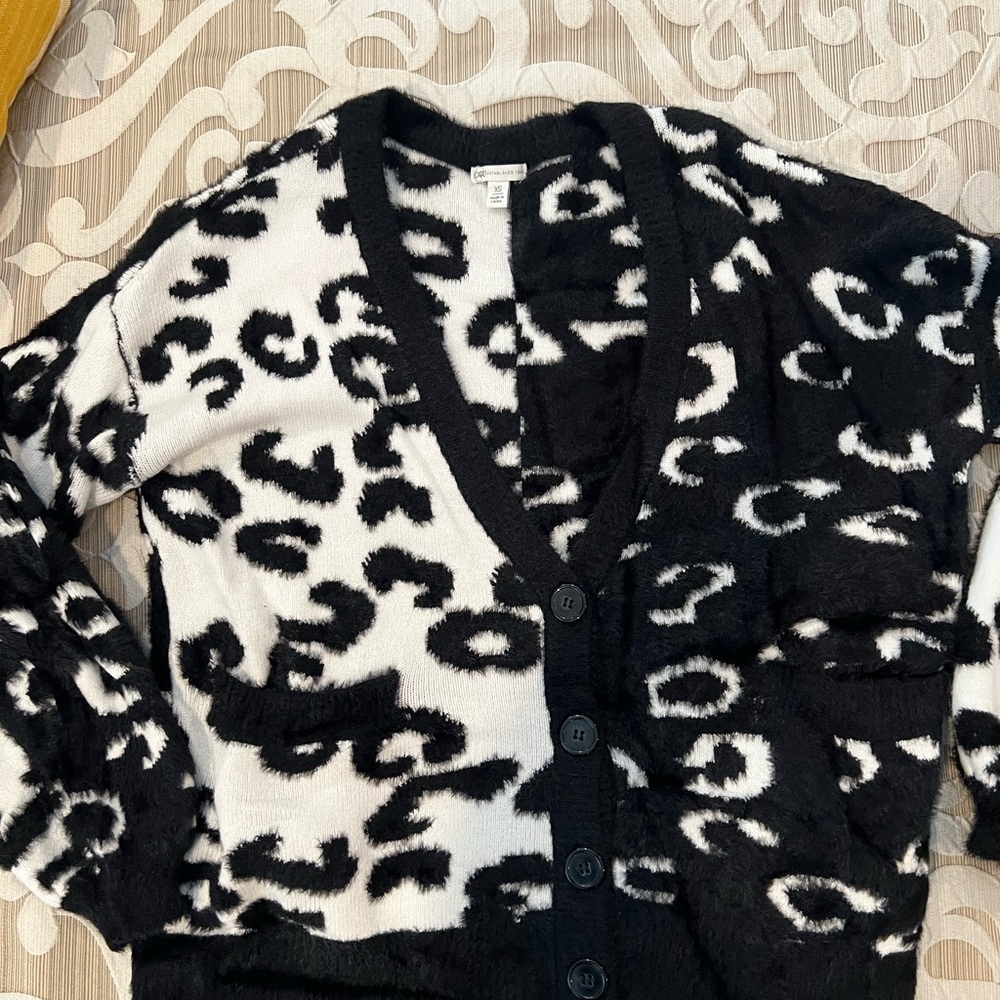 Black and White Cardigan Sweater from Cato. Size XS   Fits a little bigger.
